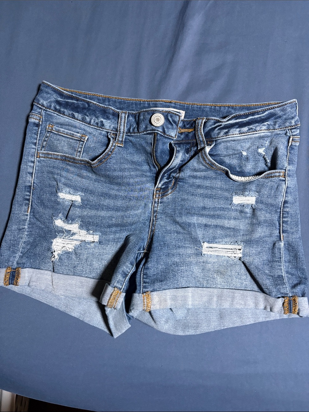 Distressed Blue Denim Roll-Cuff Shorts
